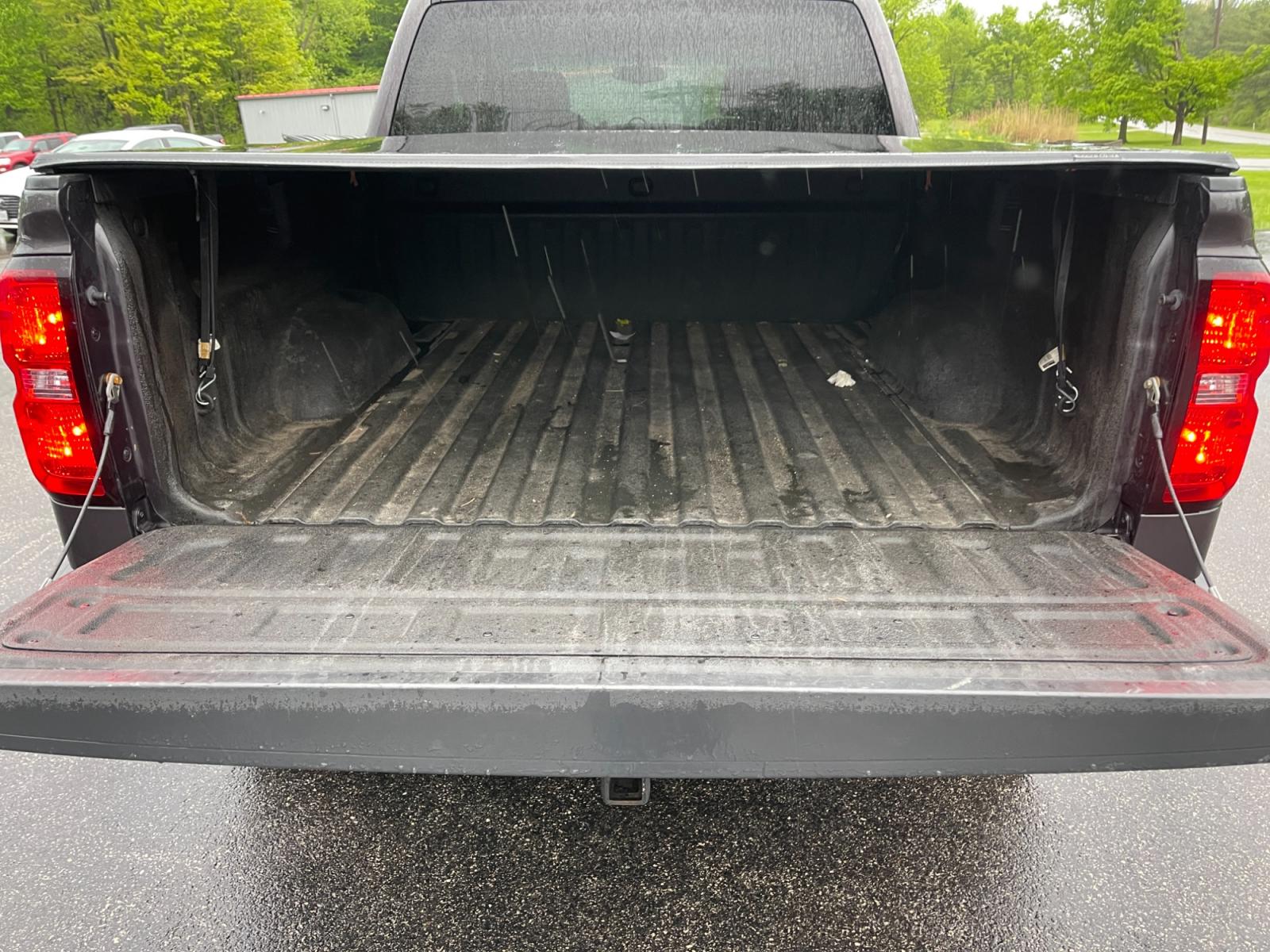 2014 Gray /Black Chevrolet Silverado 1500 LT Crew Cab 4WD (3GCUKREC7EG) with an 5.3L V8 OHV 16V engine, 6-Speed Automatic transmission, located at 11115 Chardon Rd. , Chardon, OH, 44024, (440) 214-9705, 41.580246, -81.241943 - This 2014 Chevrolet Silverado 1500 LT Crew Cab is a capable and well-equipped pickup truck. It's powered by a 5.3L Vortec V8 engine mated to a 6-speed automatic transmission with 3.42 gearing, delivering a robust 9,100-pound towing capacity. This particular model is lifted and rides on 33-inch all-t - Photo #10